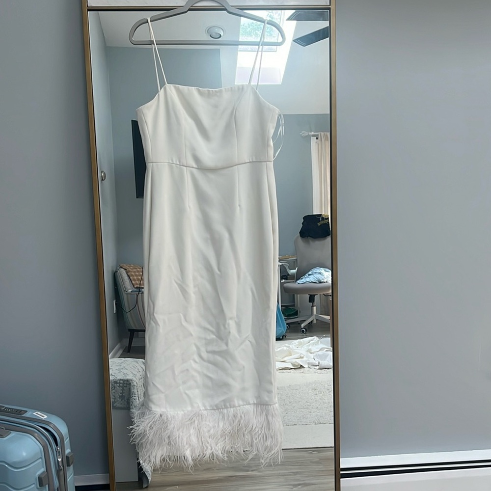 White feather trimmed dress
